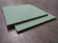 Cloison, isolation (réemploi)  -  Dalle plafond isolant laine de verre revêtue turquoise 60x60 cm, ép. 25 mm (réemploi)