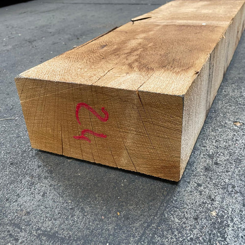 Traverse paysagère en chêne 100 x 200 mm, longueur 2,2 m, gros plan sur l'extrémité